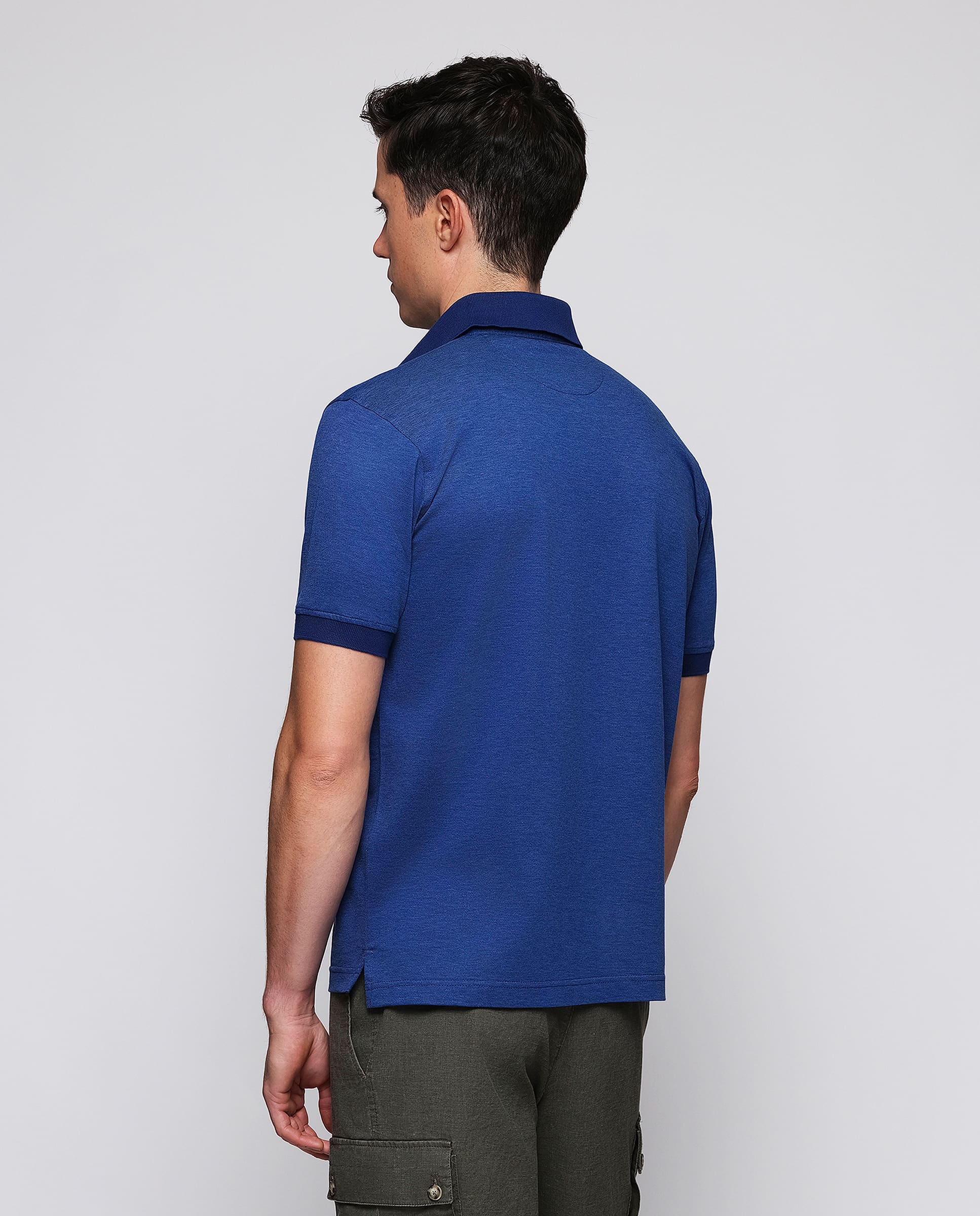 Polo azul de piqué con detalles florales - Image 3