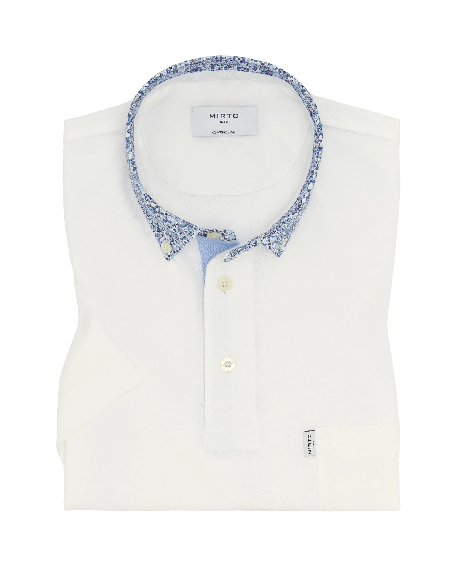 Polo blanco de piqué cuello camisero floral